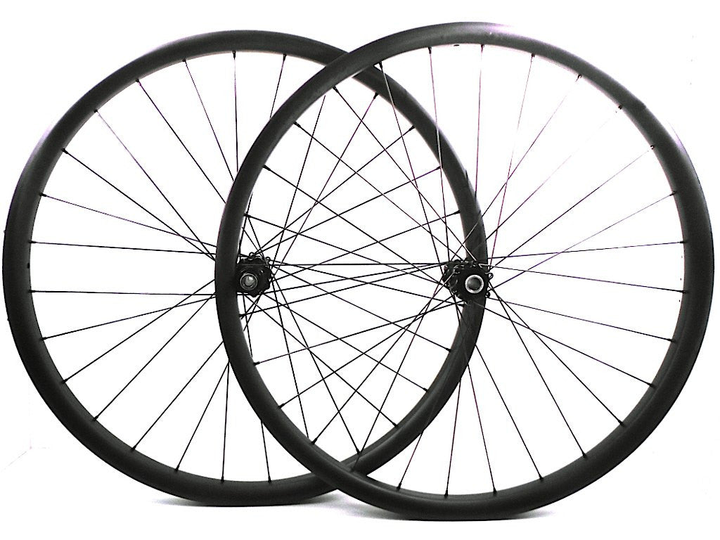 Steve’s Carbon Disaster – Averted! Carbon 650b hoops on Giant/DT Swiss hubs.