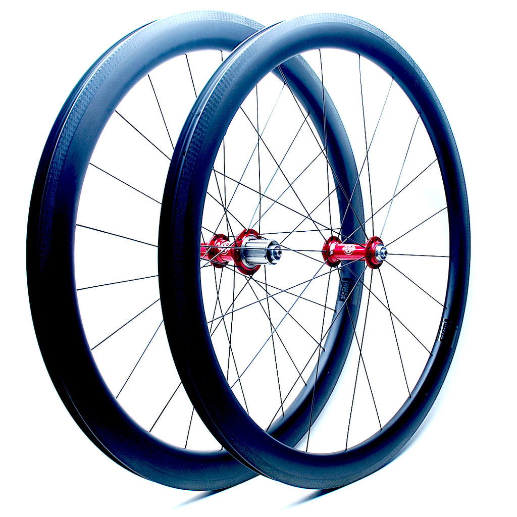 Will's Tailwind Carbon Hoops on Red Anodised White industries T11 hubs