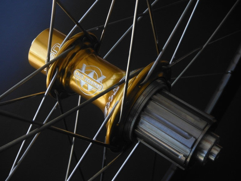Vu’s Mango Goodness - White Industries T11 hubs in Gold on Hplusson Archetype in Grey Ano